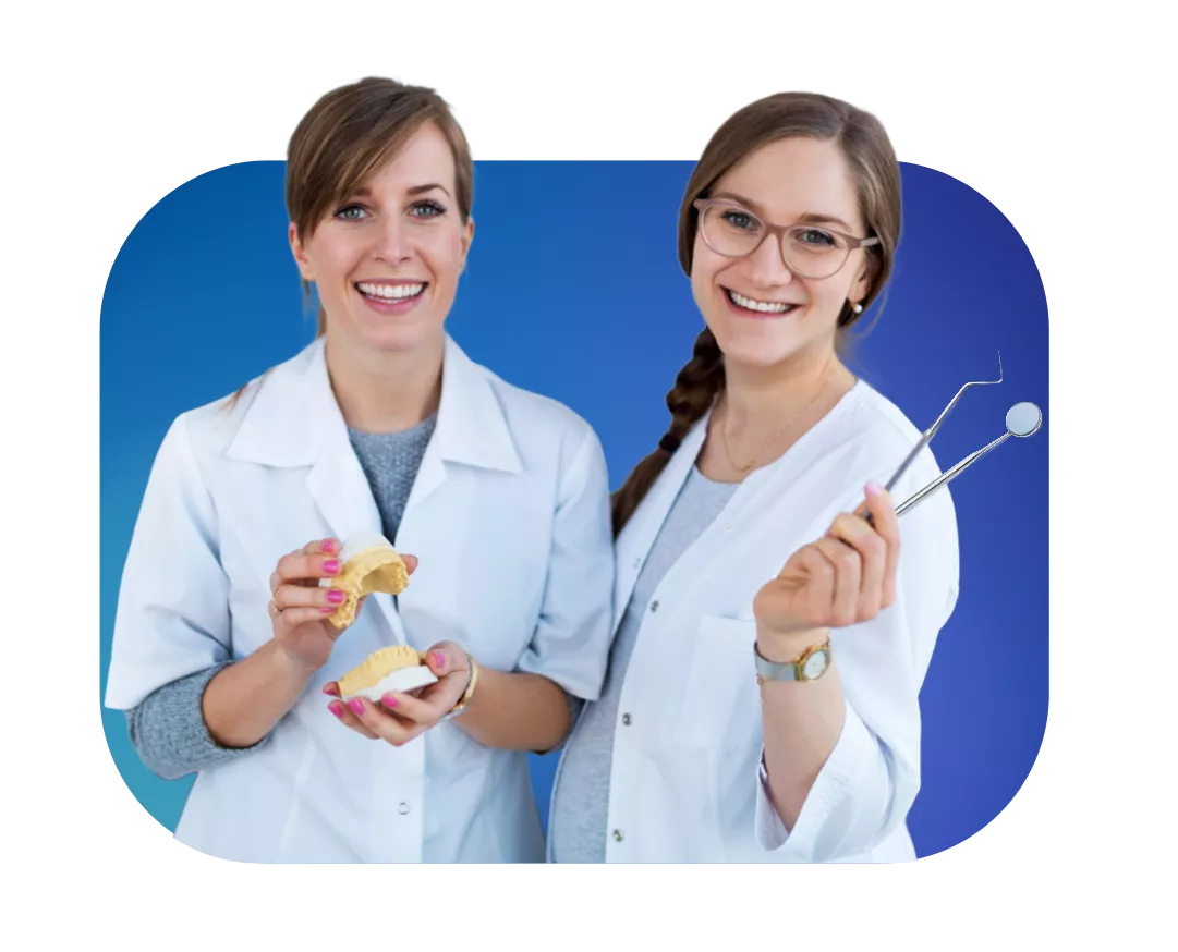 two girls blue background in white coats